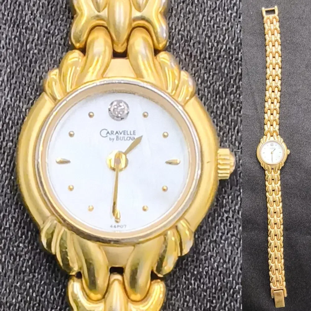 Caravelle by Bulova 44P07 women's Watch Gold Tone Round White Face #W5153